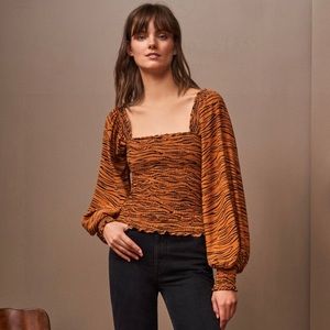 La Ligne Eloise Smocked Off the Shoulder Top in Tiger Print